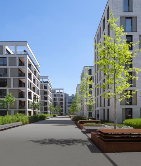 Modern apartment buildings and trees.